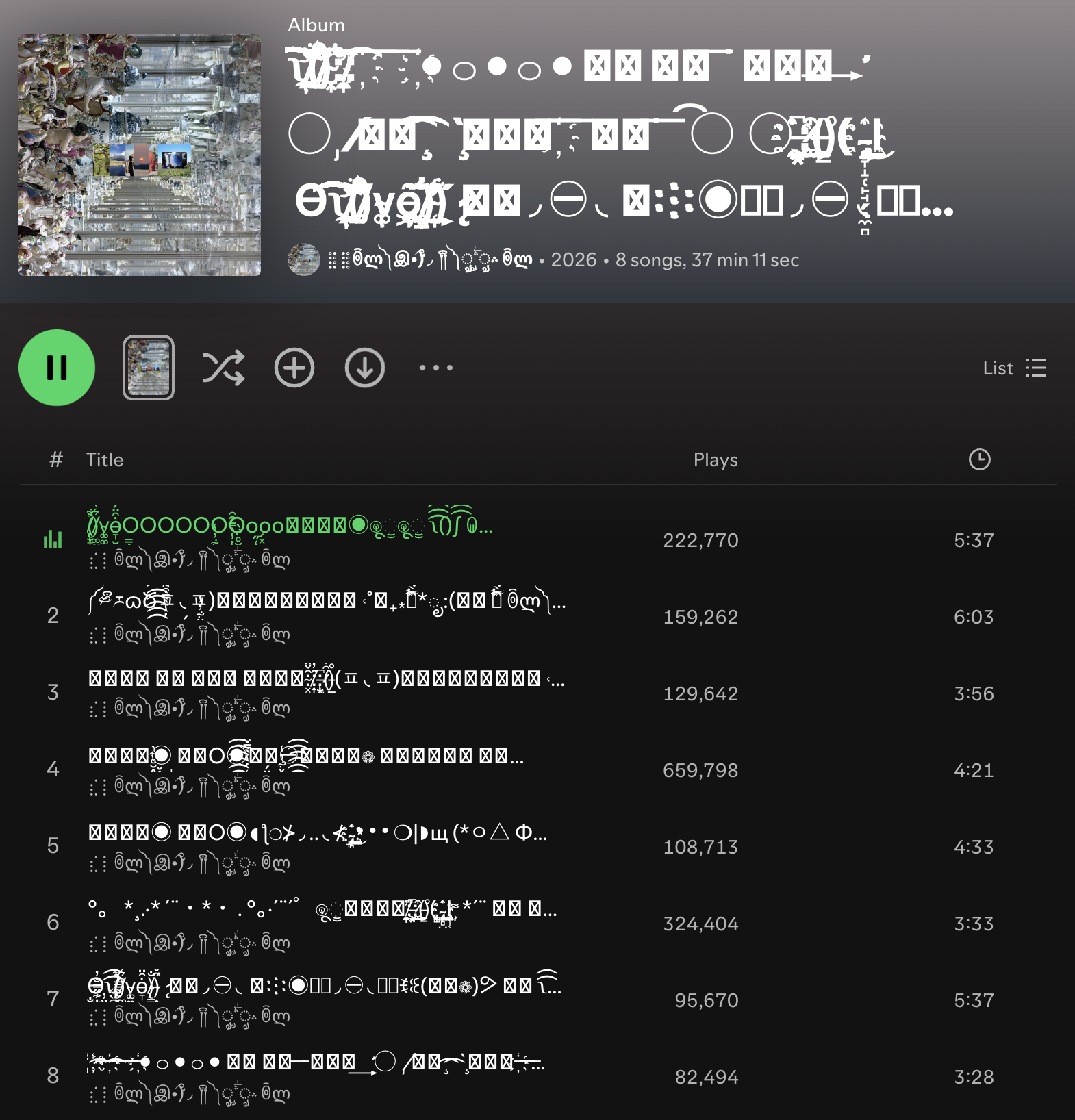 Full Spotify album view with Wingdings title and tracklist